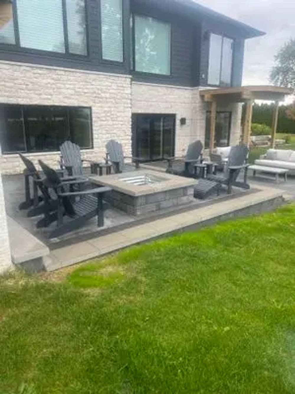 Two-Tier Patio with Fire Pit on a New Build in White Lake Township